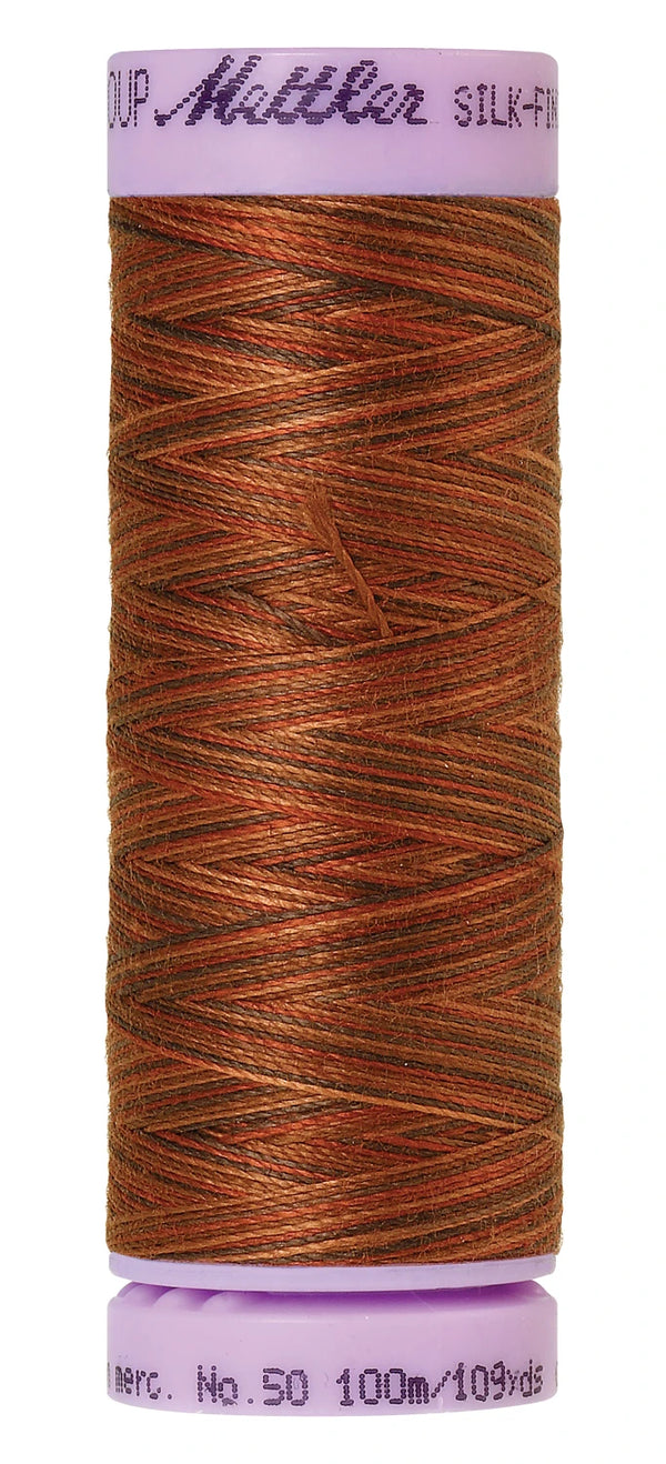 Mettler 9852 Silk-Finish 50wt Variegated Cotton Thread 109yd/100M Chocolatte
